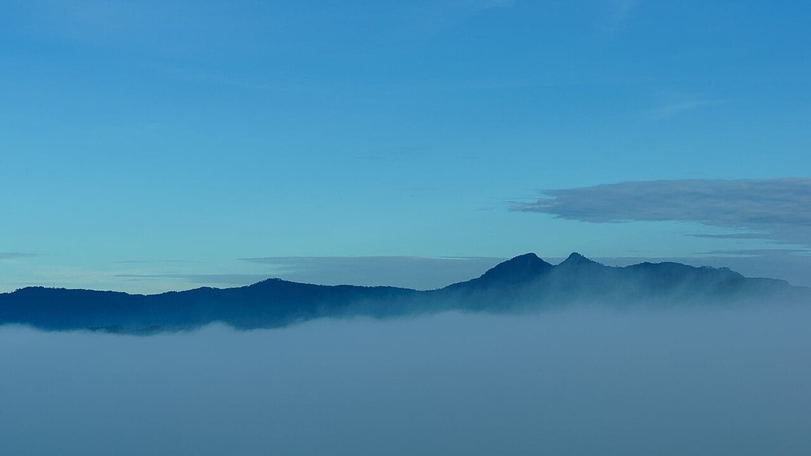 Misty hills and clouds near Hon Bo at sunrise, Da Lat